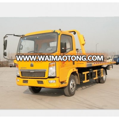 SINOTRUK HOWO 116hp 4x2 flatbed road wrecker tow trucks